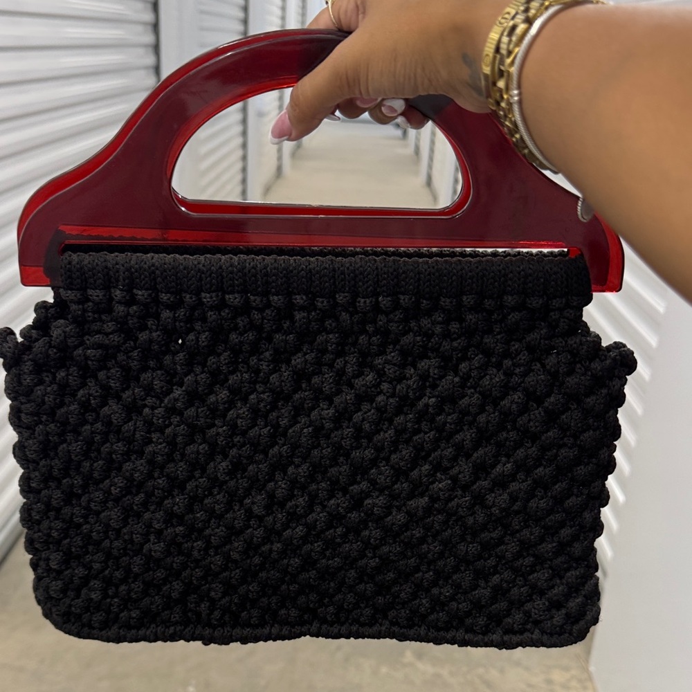 Elegant Black Handwoven Bag with Red Handle
